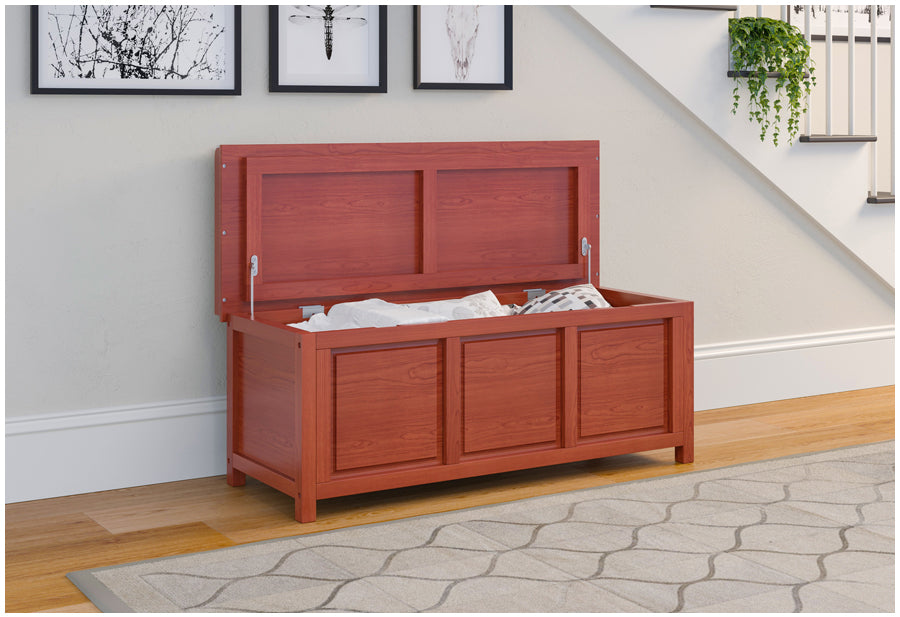 Red Mahogany open top storage bench  with lid open organizing pillows and blankets in stairwell hallway