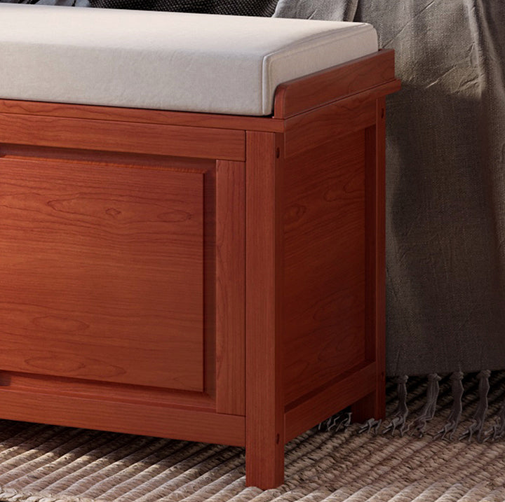 close up of John Louis Home solid wood finish on storage bench