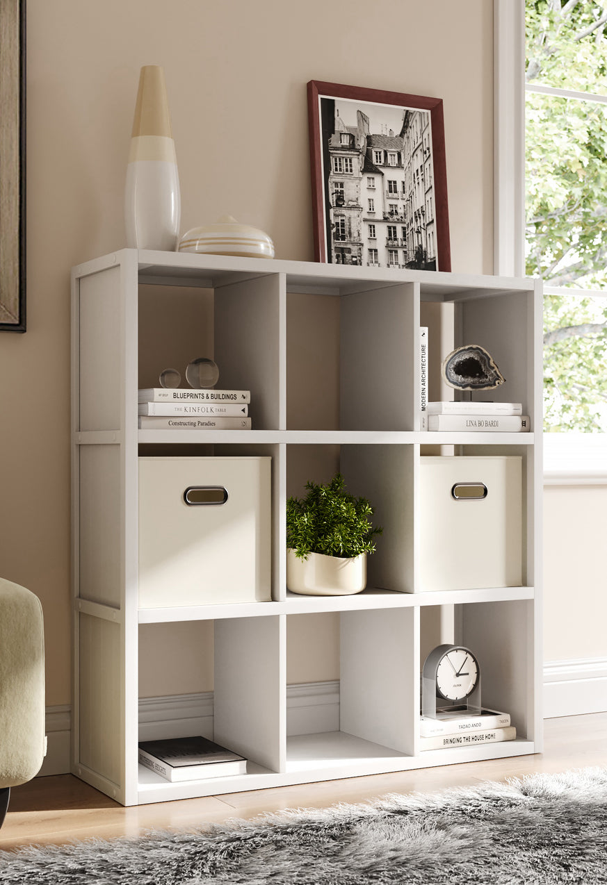 white storage. cube organizer with fabric bins in living room